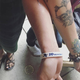 Paris Jackson and Macauly Culkin spoon tattoos.